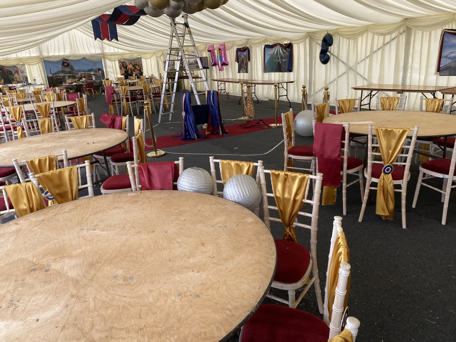 Inside the marquee at Old Buckenham Air Show with display fridges and event seating