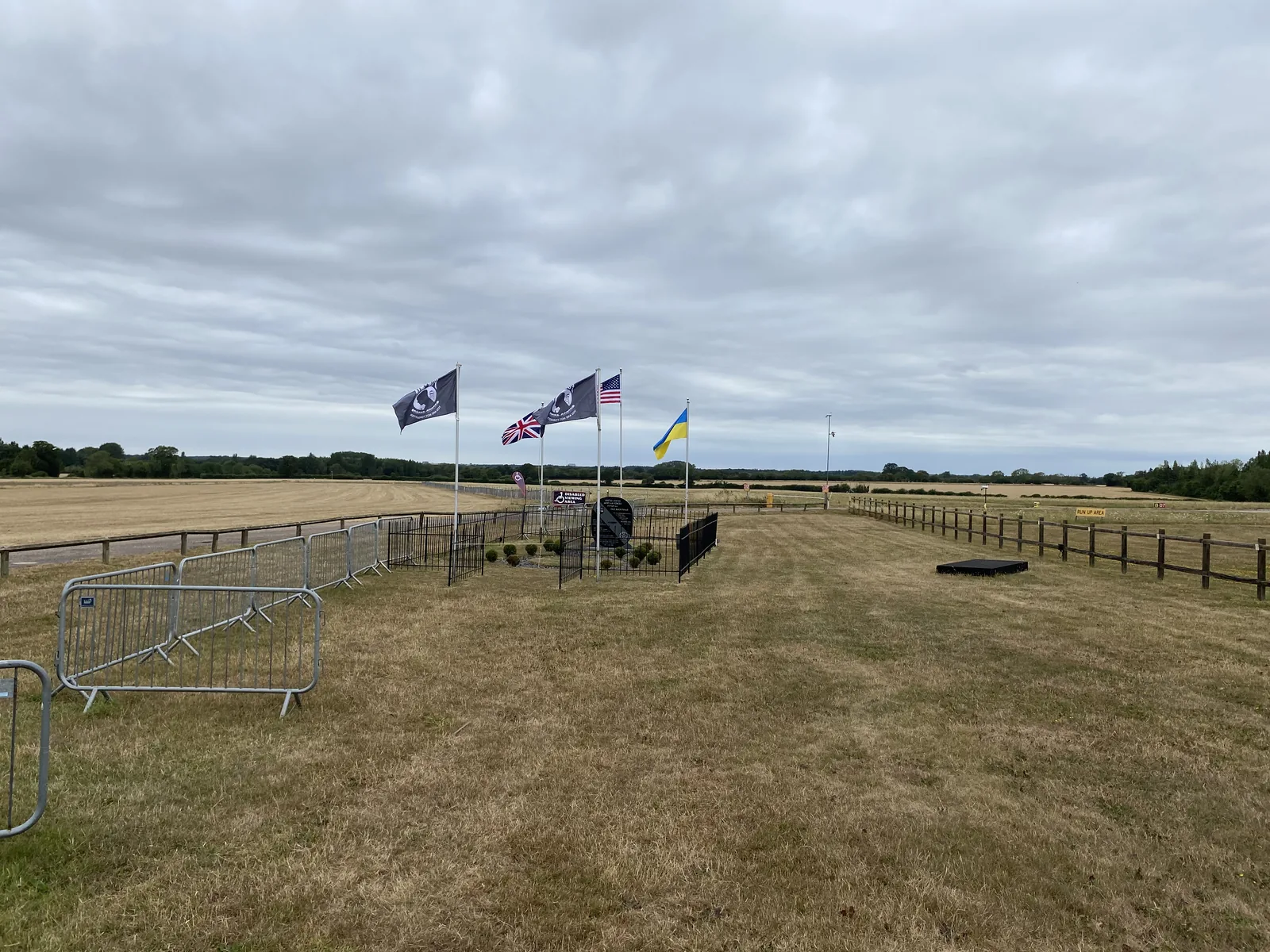 Old Buckenham Air Show site with refrigerated trailer and event setup