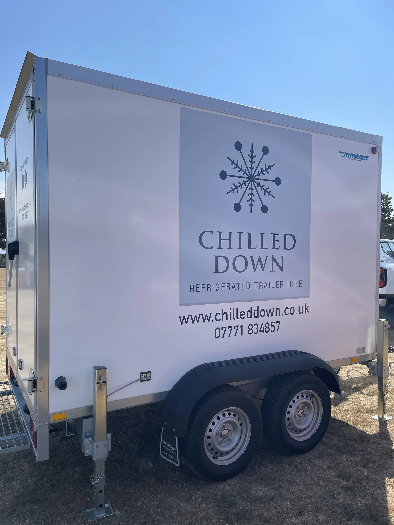 Chilled Down refrigerated trailer at Hunstanton showing snowflake branding and contact details