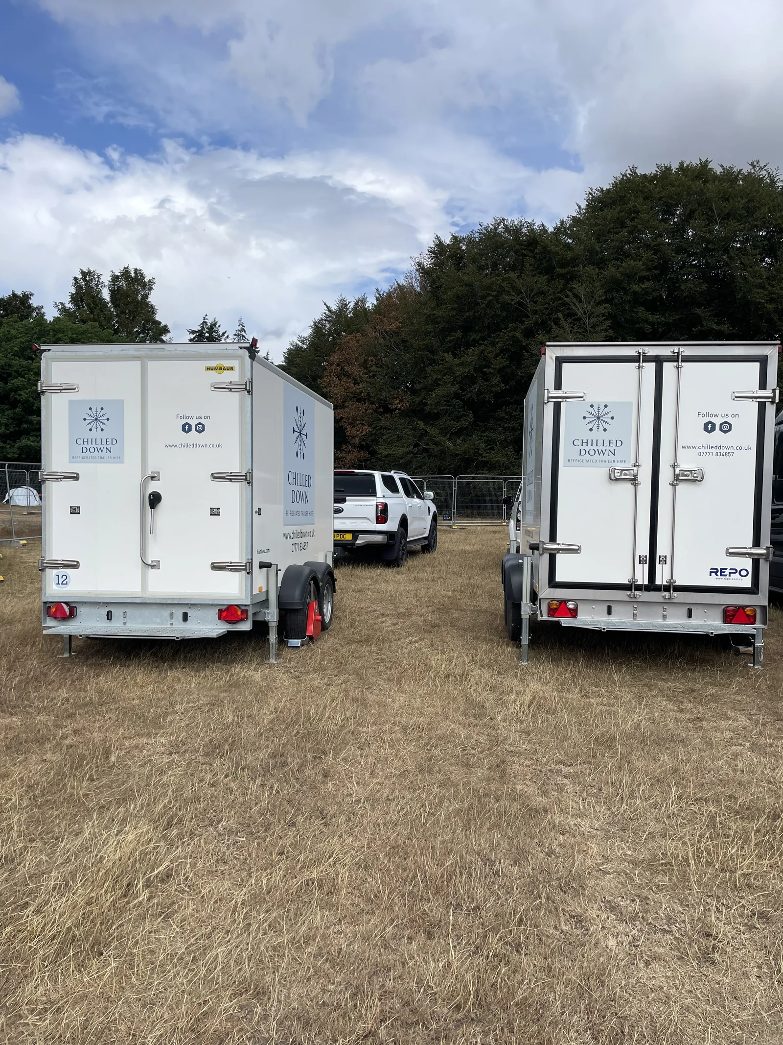 Rear view of two Chilled Down refrigerated trailers at Field Maneuvers Norfolk